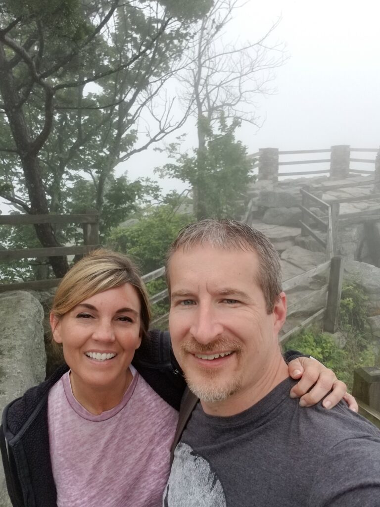 Selfie at the foggy summit overlook
