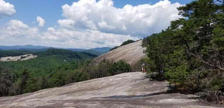 The dome falling away below the summit