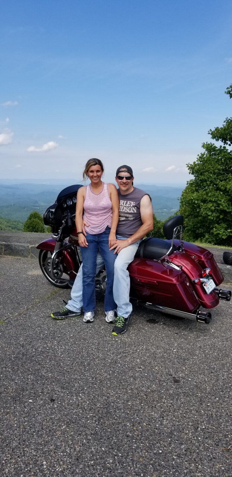 Us on the motorcycle at a Blue Ridge Parkway overlook
