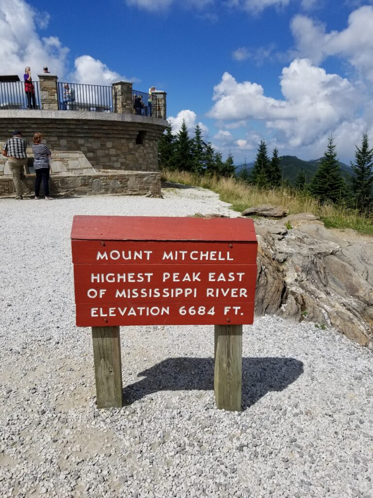 Mount Mitchell sign: highest peak east of the Mississippi River, elevation 6,684 feet