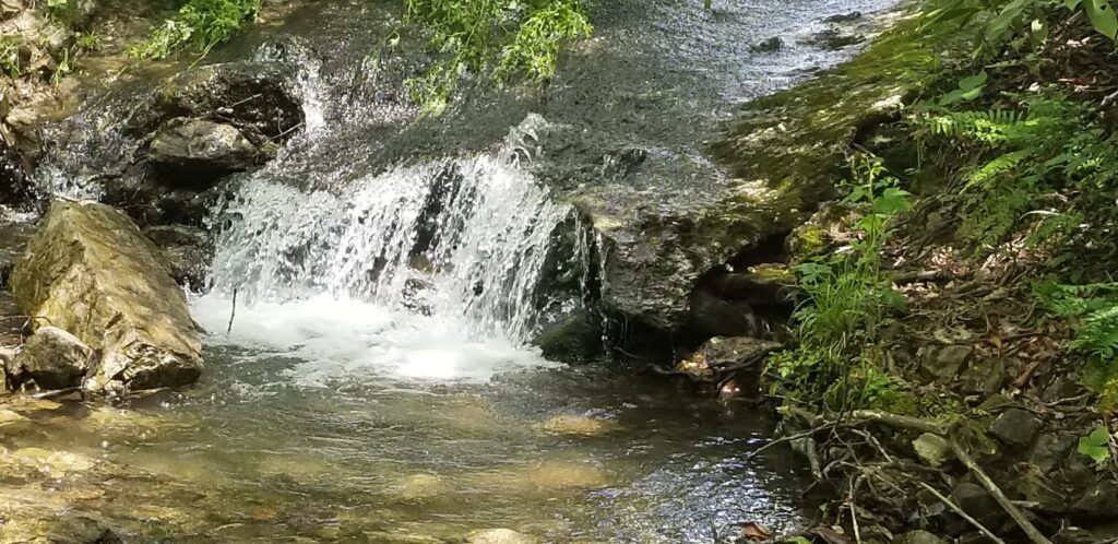 Water spilling over rocks