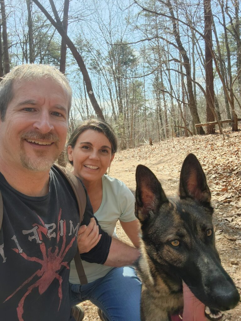 Selfie with our dog on the trail at Crowders Mountain