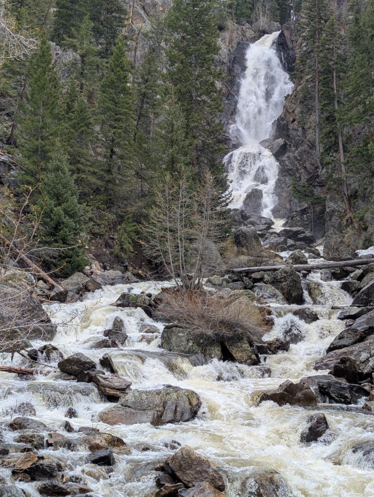Fish Creek Falls above a rushing creek