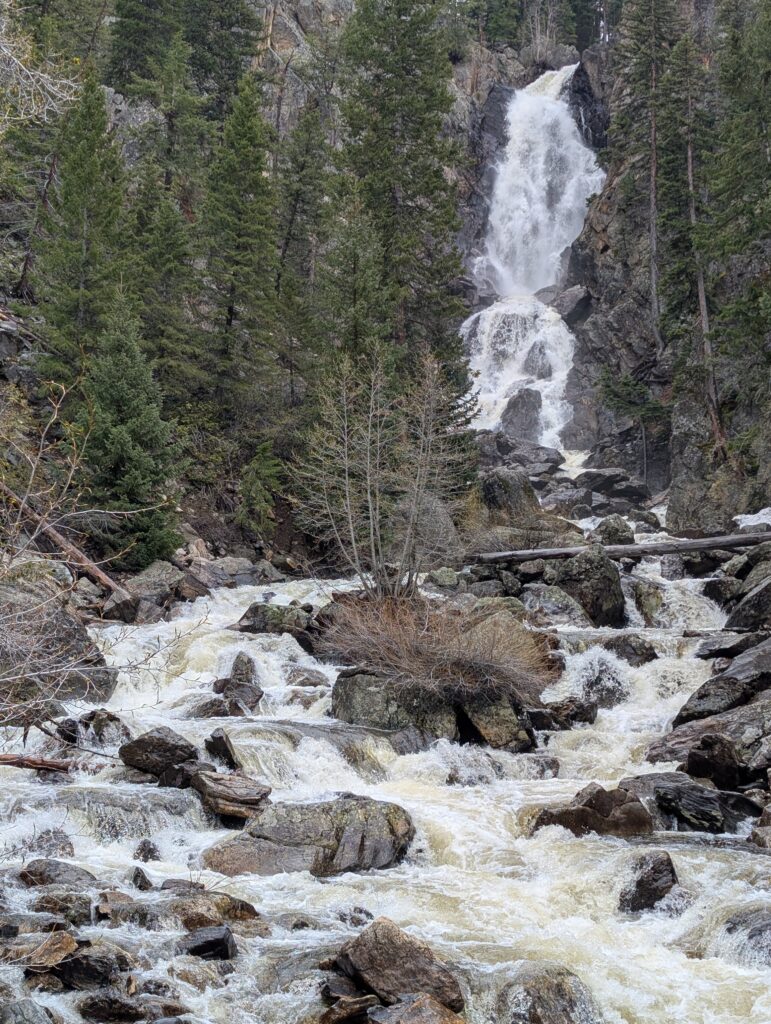 Fish Creek Falls above a rushing creek